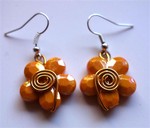 Boucles d'oreilles fleur orange: 5 €