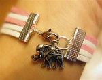 Bracelet &quot;éléphants&quot; 5 brins de cuir : 7 €