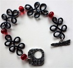 Bracelet noir et rouge craquelé
