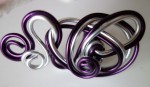 Bague entrecroisée violette et argent