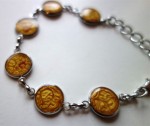 bracelet prisme bouton d'or et fleur de cerisier